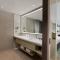 Xiamen International Seaside Hotel -Hotel corridor leads to the stone exhibition hall