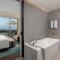 Xiamen International Seaside Hotel -Hotel corridor leads to the stone exhibition hall