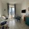 Appartement en duplex avec balcon, 5 minutes plage et centre village