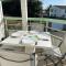 Appartement en duplex avec balcon, 5 minutes plage et centre village