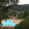 CONFORTABLE MAISON DANS VILLAGE VACANCES AVEC PISCINE A CAJARC - 卡雅克