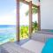 Awesome over the water overlooking West End - Aire Agua home