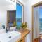 Awesome over the water overlooking West End - Aire Agua home