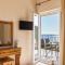 Studio Apartments with large swimming pool and Sea view at Pelekas Beach Corfu
