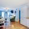 1st-floor pool-view condo with outdoor pool, beach access, balcony, W/D, & AC
