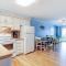 1st-floor pool-view condo with outdoor pool, beach access, balcony, W/D, & AC