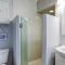 1st-floor pool-view condo with outdoor pool, beach access, balcony, W/D, & AC