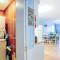 1st-floor pool-view condo with outdoor pool, beach access, balcony, W/D, & AC