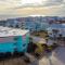 1st-floor pool-view condo with outdoor pool, beach access, balcony, W/D, & AC
