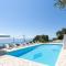 Villa Andonis Nissaki large villa with large pool ,spectacular view very near to the Beach