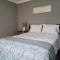 Whispering Pines Riverside Retreat