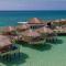 Palafitos Overwater Bungalows Catamarán, Cenote & More Inclusive - Playa del Carmen