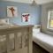 Dragonfly Cottage - Part of the The Bay Filey Holiday Village with pool, gym and direct beach access, pub, restaurant, tennis and meadows walks