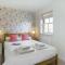East Bay Cottage - Part of the The Bay Filey Holiday Village with pool, gym and direct beach access, pub, restaurant, tennis and meadows walks