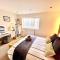 The Duplex with Air Conditioning & Private Deck Area