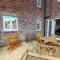 Daisy Cottage - Part of the The Bay Filey Holiday Village with pool, gym and direct beach access, pub, restaurant, tennis and meadows walks