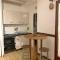 Appartement entier: chambre, cuisine + terrasse au calme sur jardin. - Marigot