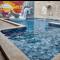 Casa com Piscina e 3 Quartos Climatizados 8km do Centro