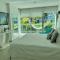 Beachfront Bliss-2BR Haven Steps from Sandy Shores