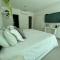 Beachfront Bliss-2BR Haven Steps from Sandy Shores