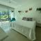 Beachfront Bliss-2BR Haven Steps from Sandy Shores