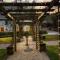 Corn Barn at East Trenean Farm -Luxury Cornish Barn Conversion sleeping 8 with hot tub, private garden, rural views and EV facilities