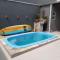 Casa com piscina, confortável e ótima localização - 伊塔尼亚恩