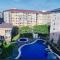 Amaia Steps Nuvali fully furnished unit with swimming pool view near Carmelray Pitland