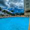 Apart Hotel Alecrim Praia de Camboinhas com Marina pe na areia