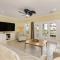 Waterfront luxury Villa 14 with spectacular sunset views and boat slip townhouse