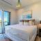Spectacular 5 BR Luxury Condo with Rooftop Pool right on the Beach, Next to the Hangout!