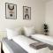Moderne Apartments im Herzen der Stadt I private Tiefgarage mit Ladesäulen I home2share