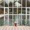 Cotswolds Lake side home with luxury spa Swallows Nest,Lower Mill Estate, Lakeside home and spa with a Harry Potter cupboard under the stairs