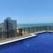 Lindo Flat frente praia