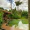 Casa Rosa - Terra Dourada, Paraíso na Natureza, piscina natural, Wi-Fi