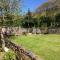 Lovely cottage in Snowdonia, private hot tub, by mountains & award winning beach - Fairbourne