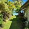 Fare Matairoa - Cozy Cottage w Pretty Beachfront