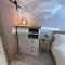 Self contained double bedroom with ensuite, private entrance, free parking , 5 min walk to beach