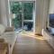 Sunny apartment with forest view