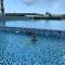 Desaru Utama Apartment with Swimming Pool View, Karaoke, FREE WIFI, Netflix, near to Car Park - Desaru
