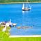 Timber house with private beach and boat including.