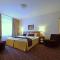 Comfort Hotel tom Kyle