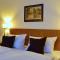 Comfort Hotel tom Kyle