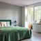 Green bed by the pine forest