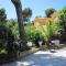 Studio dans villa de charme, piscine, proche plage