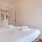 Sunny 2 BDR Apartment by LovelyStay