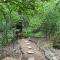 Hobbit Treehouse with waterfall on the Brazos River! 350 acres! Tubing! Petting zoo!