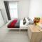 Luxurious House near Excel- Air Conditioning, 9 Beds, 2 Baths, Garden, fast WiFi
