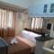 SnugglePod Condotel - Grand Riviera Suites