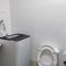 Anne and Gie 1 BR Condo Unit with kitchenette in Trees Residences SMDC - 马尼拉